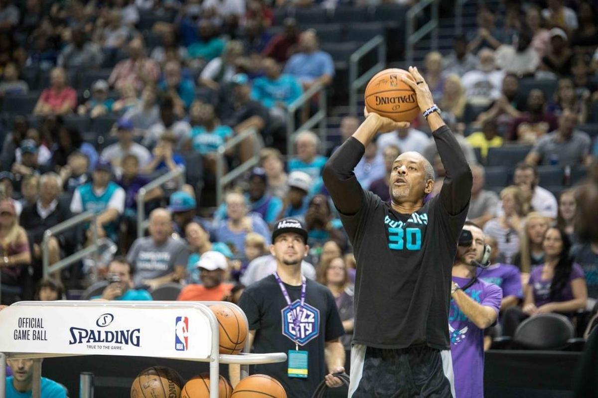 Dell Curry, the Charlotte Hornets’ all-time leading scorer, competes in the team’s 3-point shooting contest during Saturday’s open practice at the Spectrum Center.