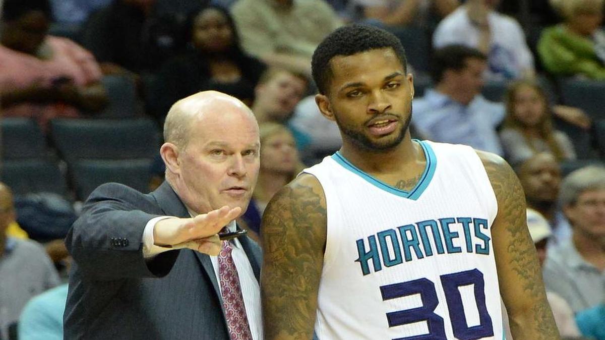 
Charlotte Hornets guard Troy Daniels, right, takes instruction from coach Steve Clifford in a game last season.
