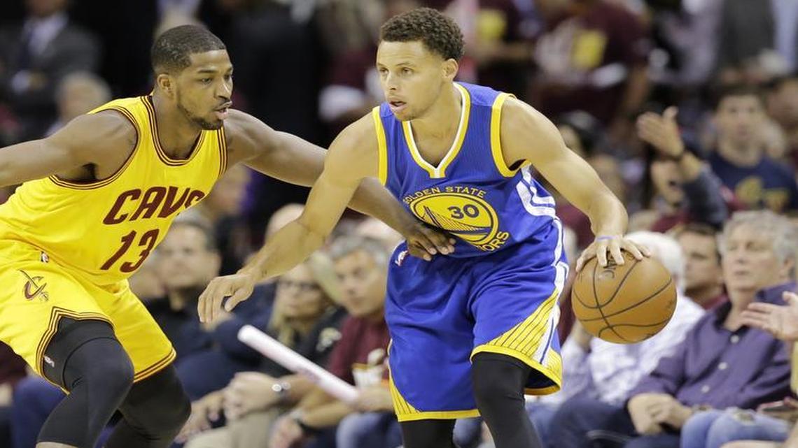 
Cleveland Cavaliers center Tristan Thompson (13) defends Golden State Warriors guard Stephen Curry (30) during Game 3 of the NBA Finals in Cleveland, Tuesday, June 9, 2015. 
