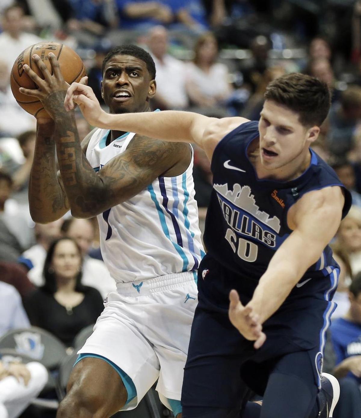 Charlotte Hornets coach Steve Clifford said he sees rookie Dwayne Bacon, left, as having starter potential.