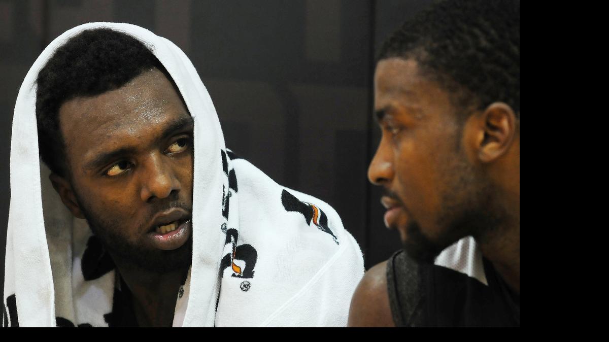 
P.J. Hairston, left, was cited by Charlotte-Mecklenburg Police on June 18 for driving with a revoked license, speeding, driving left of center and driving with expired tags.
