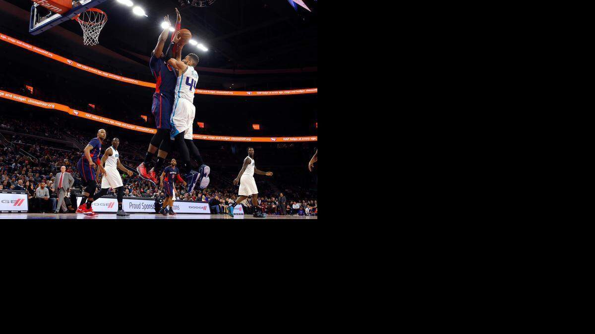 
Detroit Pistons center Andre Drummond (0) defends against Charlotte Hornets forward Jeff Taylor (44) in the first half of an NBA basketball game in Auburn Hills, Mich., Sunday, March 8, 2015. 
