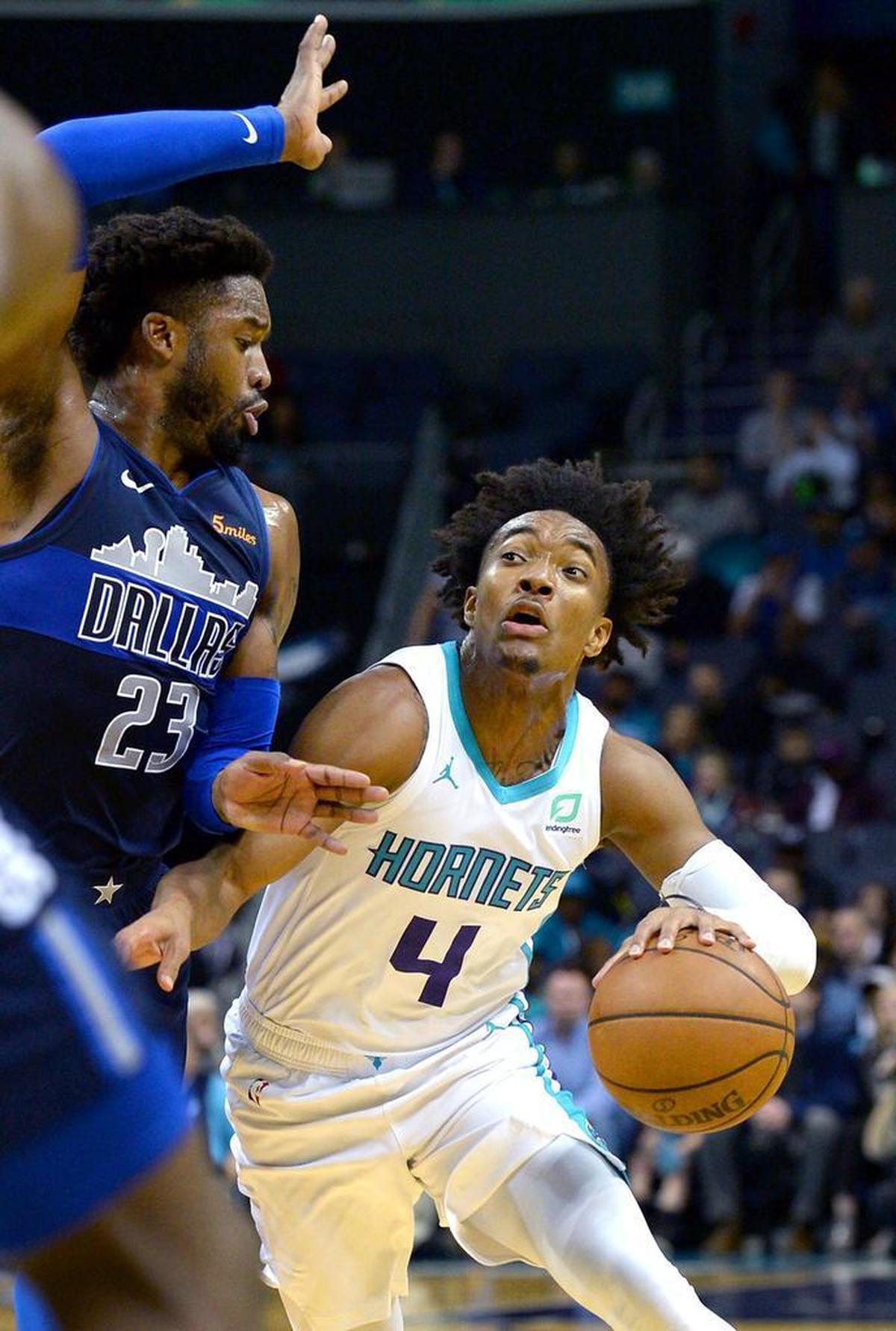 Charlotte Hornets rookie Devonte Graham, right, made his first NBA start Wednesday in place of injured shooting guard Jeremy Lamb.