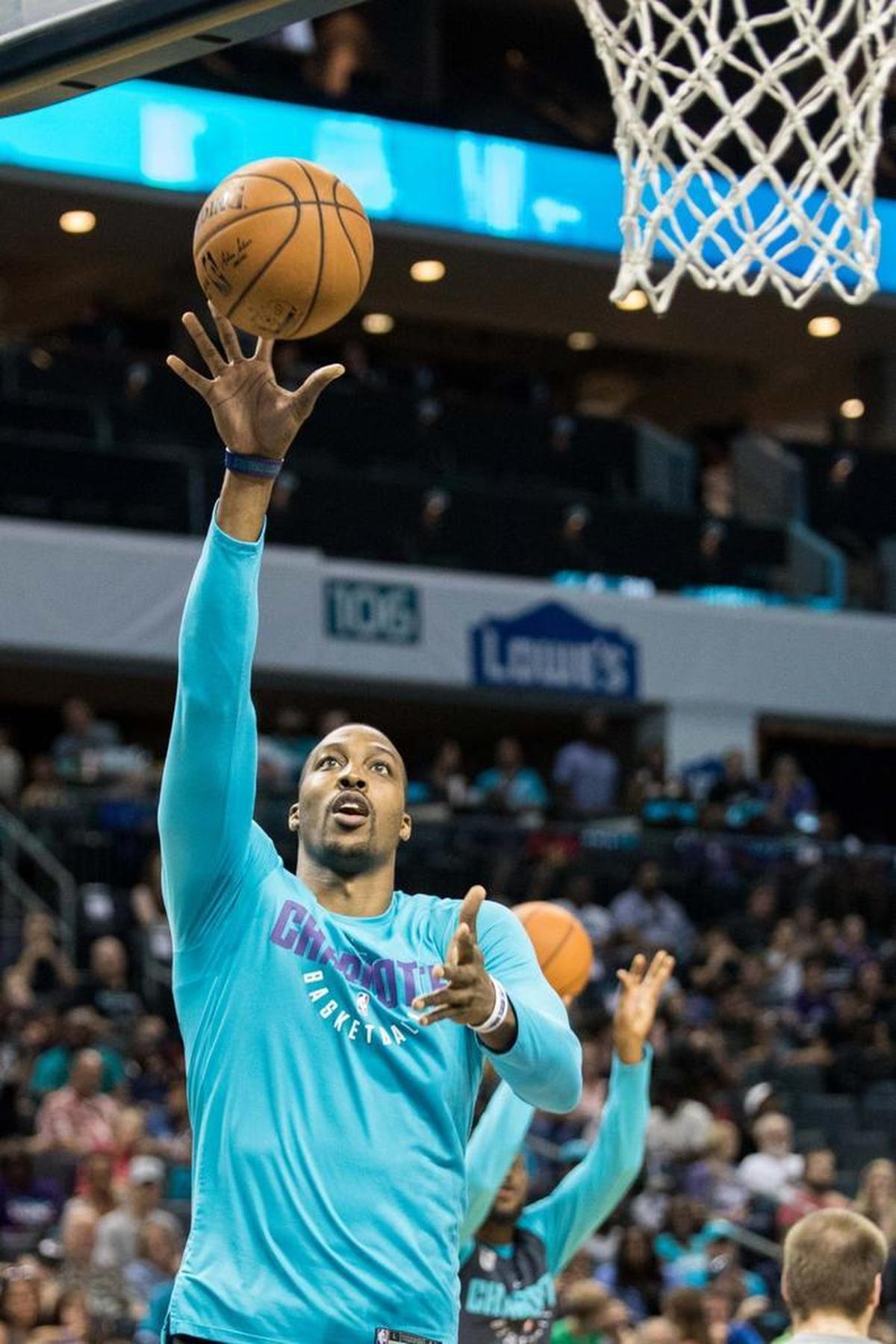 Charlotte Dwight Howard drives to the basket during open practice Saturday at Spectrum Center, where a crowd of about 15,000 attended.