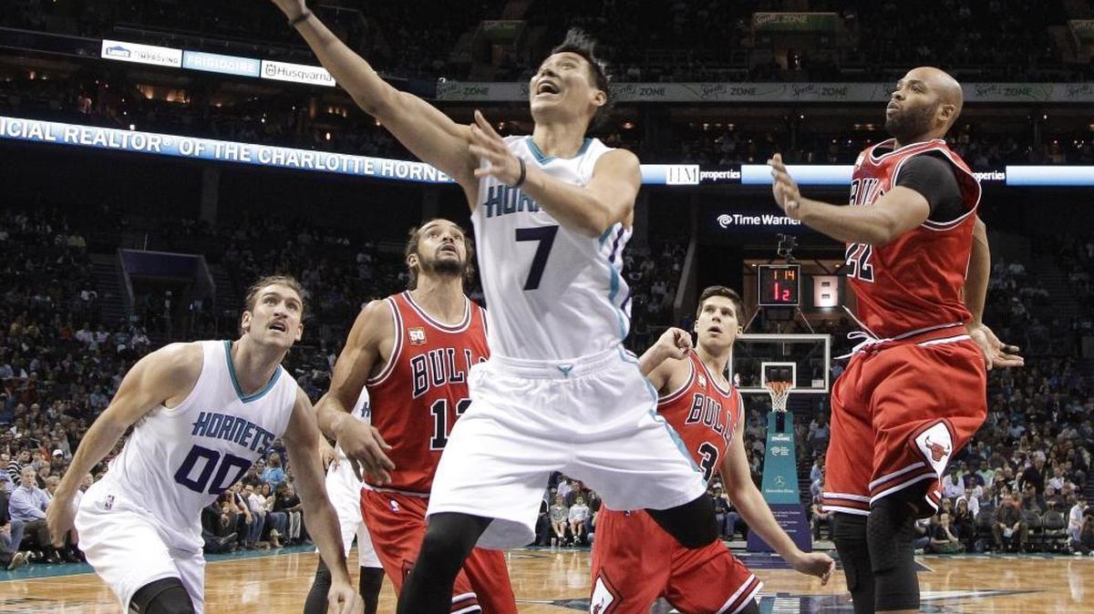 Charlotte Hornets' Jeremy Lin (7) drives past Chicago Bulls' Taj Gibson (22) during the first half of an NBA basketball game in Charlotte, N.C., Tuesday, Nov. 3, 2015.