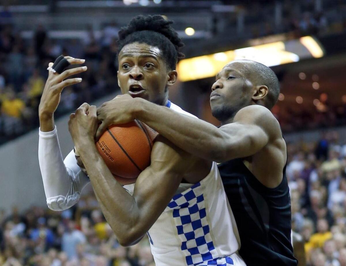 Kentucky Wildcats guard De'Aaron Fox, left, is a terrific competitor.