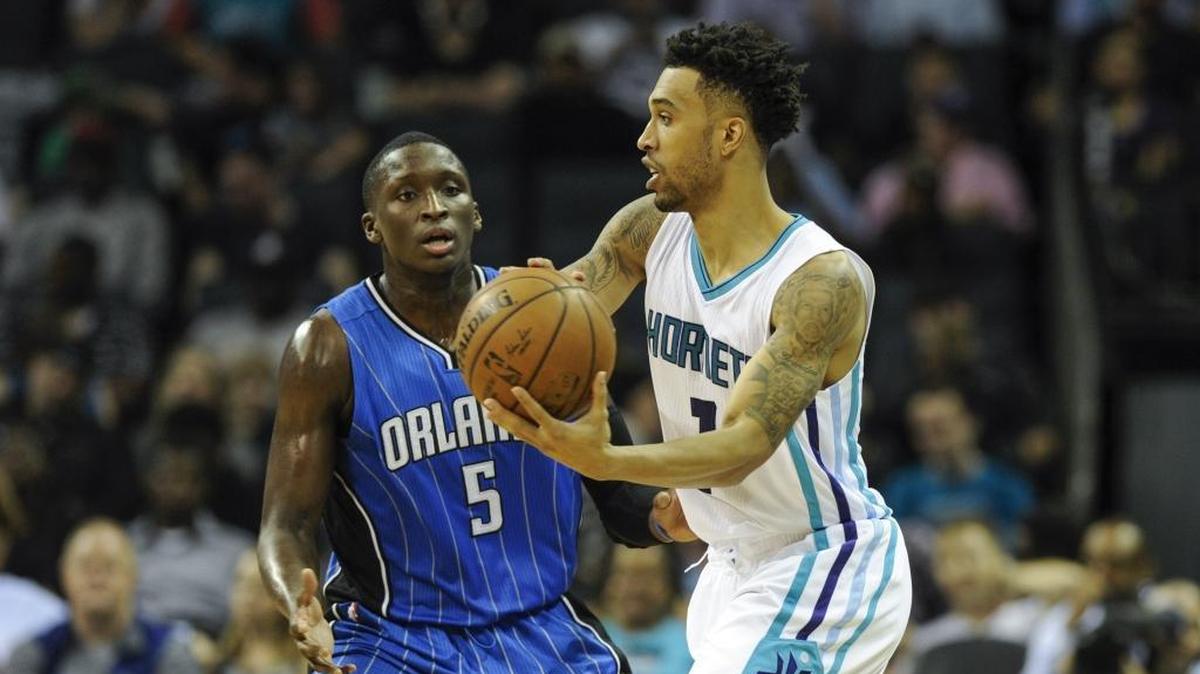 Charlotte Hornets guard Courtney Lee, right, has been a strong defender, filling some of the gap left by Michael Kidd-Gilchrist’s shoulder injury.