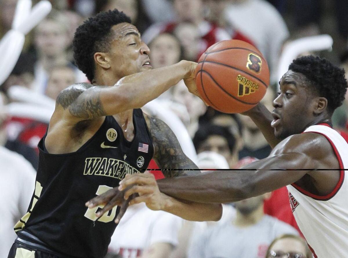 Wake Forest's John Collins, left, is coming off a breakthrough sophomore season in which he averaged 19.2 points, 9.8 rebounds and 62 percent shooting from the field.