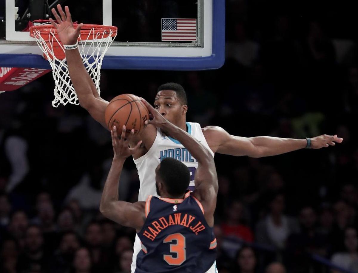 New York Knicks forward Tim Hardaway Jr. (3) shoots against Charlotte Hornets center Dwight Howard (12) during the first quarter of Saturday’s game. The Knicks won 124-101.