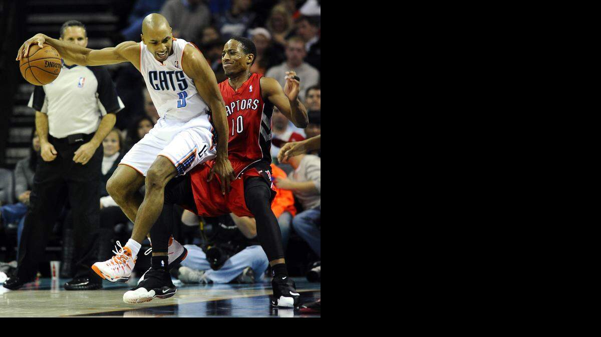 
Gerald Henderson (9) works against the Toronto Raptors' DeMar DeRozan (10) two seasons ago.

