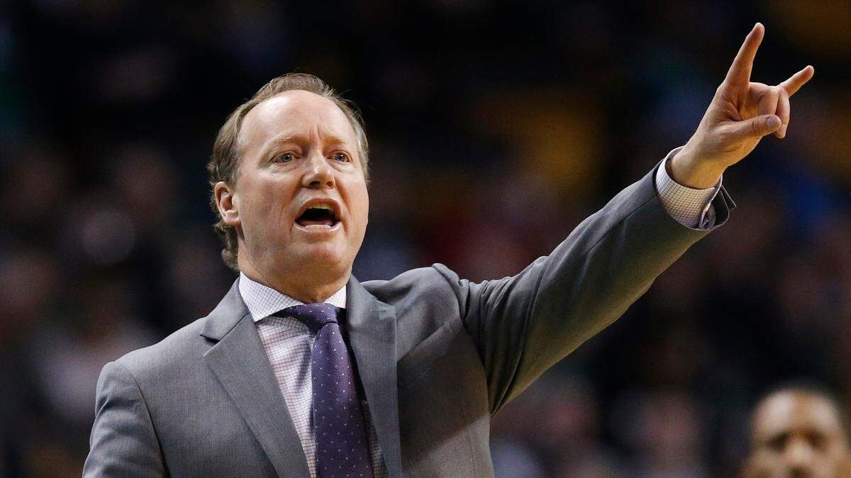Atlanta Hawks head coach Mike Budenholzer signals during the third quarter of an NBA basketball game against the Boston Celtics in Boston, Sunday, April 8, 2018. The Hawks won 112-106. (AP Photo/Michael Dwyer)