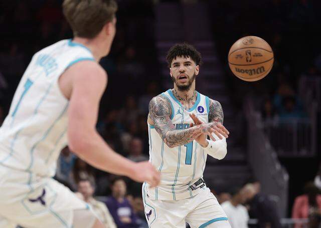 Charlotte Hornets guard LaMelo Ball passes the ball to Kon Knueppel during the second half of the game against the Sacramento Kings Tuesday.