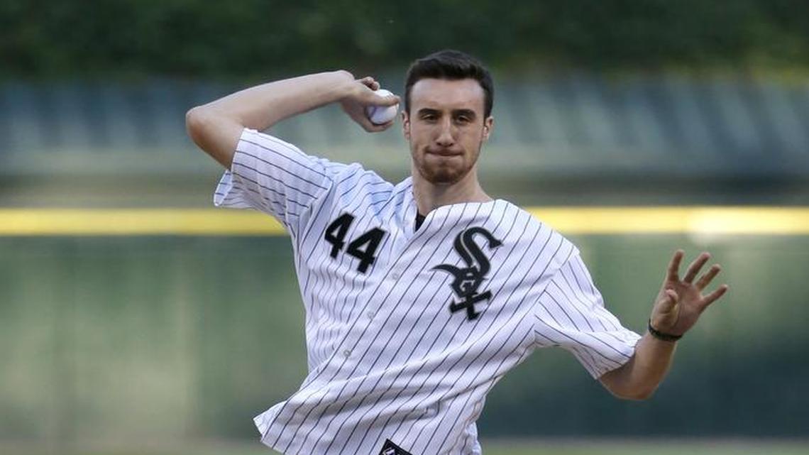 Charlotte Hornets center Frank Kaminsky won $100 bet by throwing an 85 mph fastball. Above, Kaminsky throws out the ceremonial first pitch before a game between the Chicago White Sox and the St. Louis Cardinals in 2015.