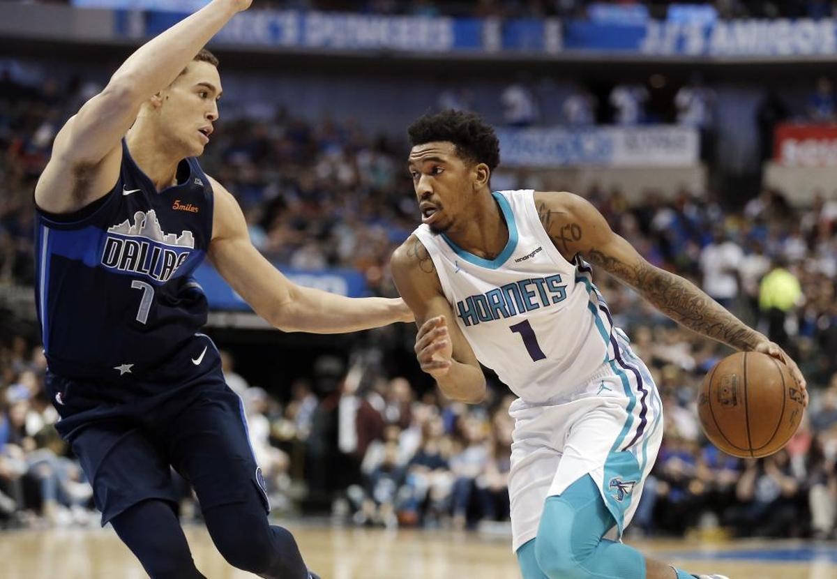 Charlotte Hornets guard Malik Monk (1) drives against Dallas Mavericks forward Dwight Powell (7) during Saturday’s game. Monk scored 11 points in 15 minutes of playing time off the bench.