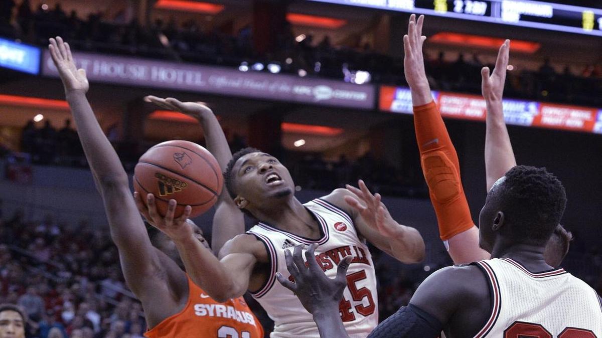 Louisville's Donovan Mitchell (45) is among six draft candidates invited to a Charlotte Hornets workout Monday.