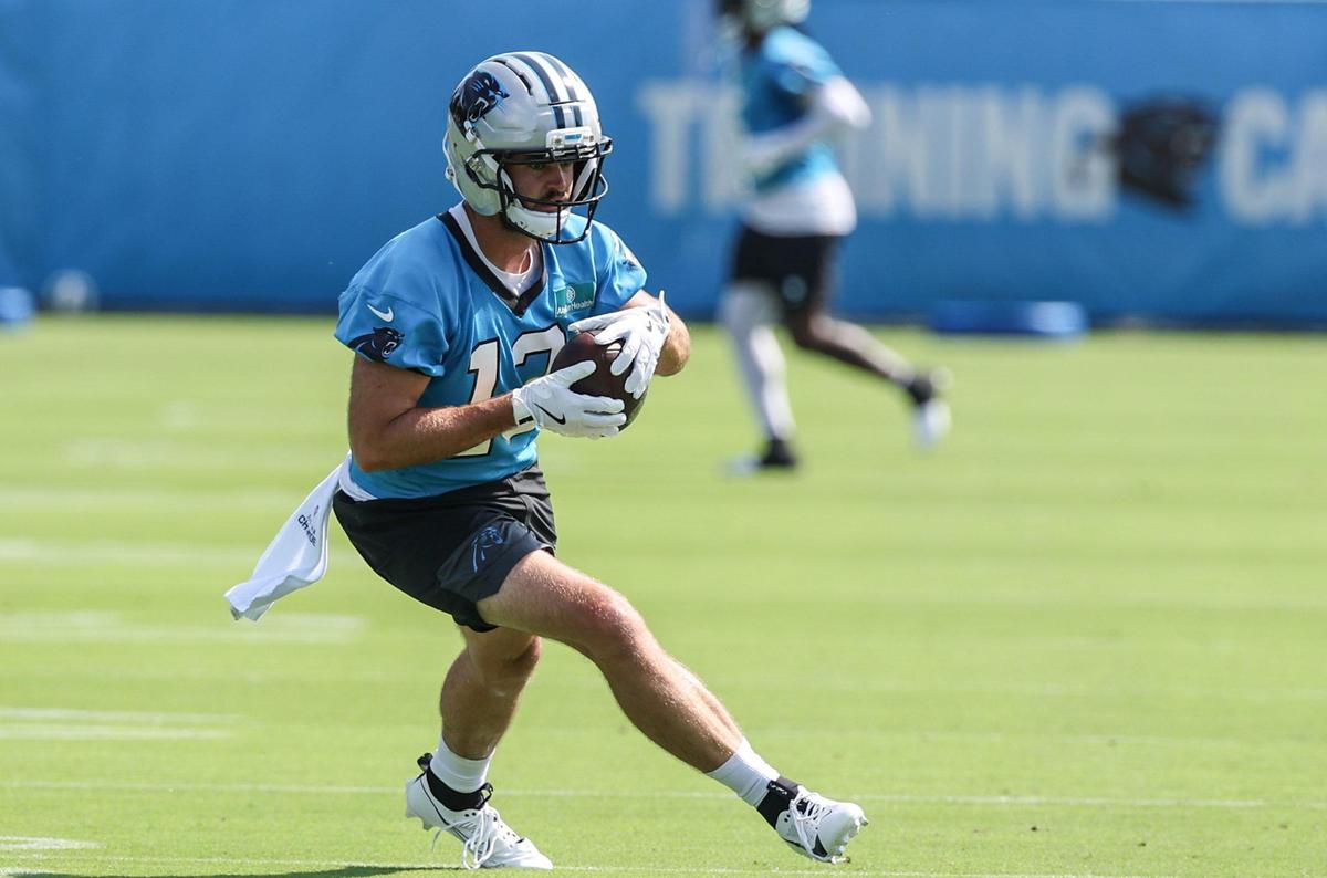 Panthers wide receiver Hunter Renfrow tucks in a caught pass during training camp in Charlotte, NC on Wednesday, July 24, 2025.
