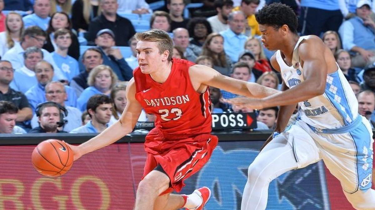 Davidson’s Peyton Aldridge (23) drives past North Carolina’s Isaiah Hicks (04) in the first half of Wednesday’s game at the Dean E. Smith Center in Chapel Hill.