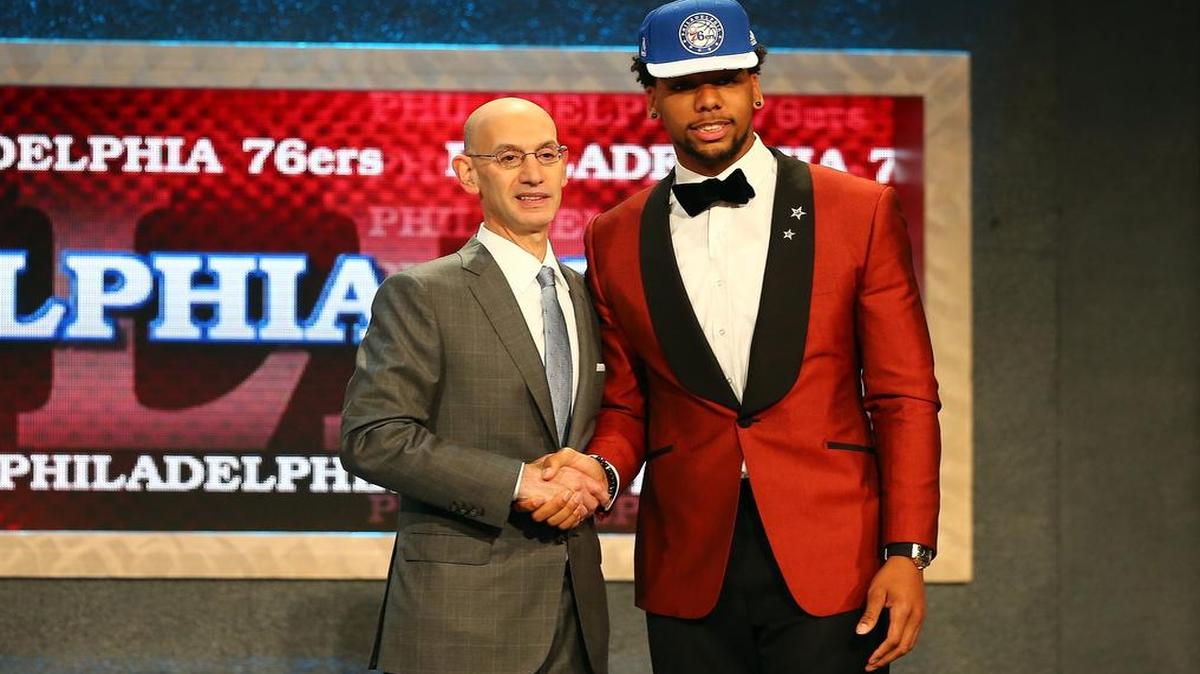 
Jahlil Okafor poses with Commissioner Adam Silver after being selected third overall by the Philadelphia 76ers in the First Round of the 2015 NBA Draft at the Barclays Center on June 25, 2015. 
