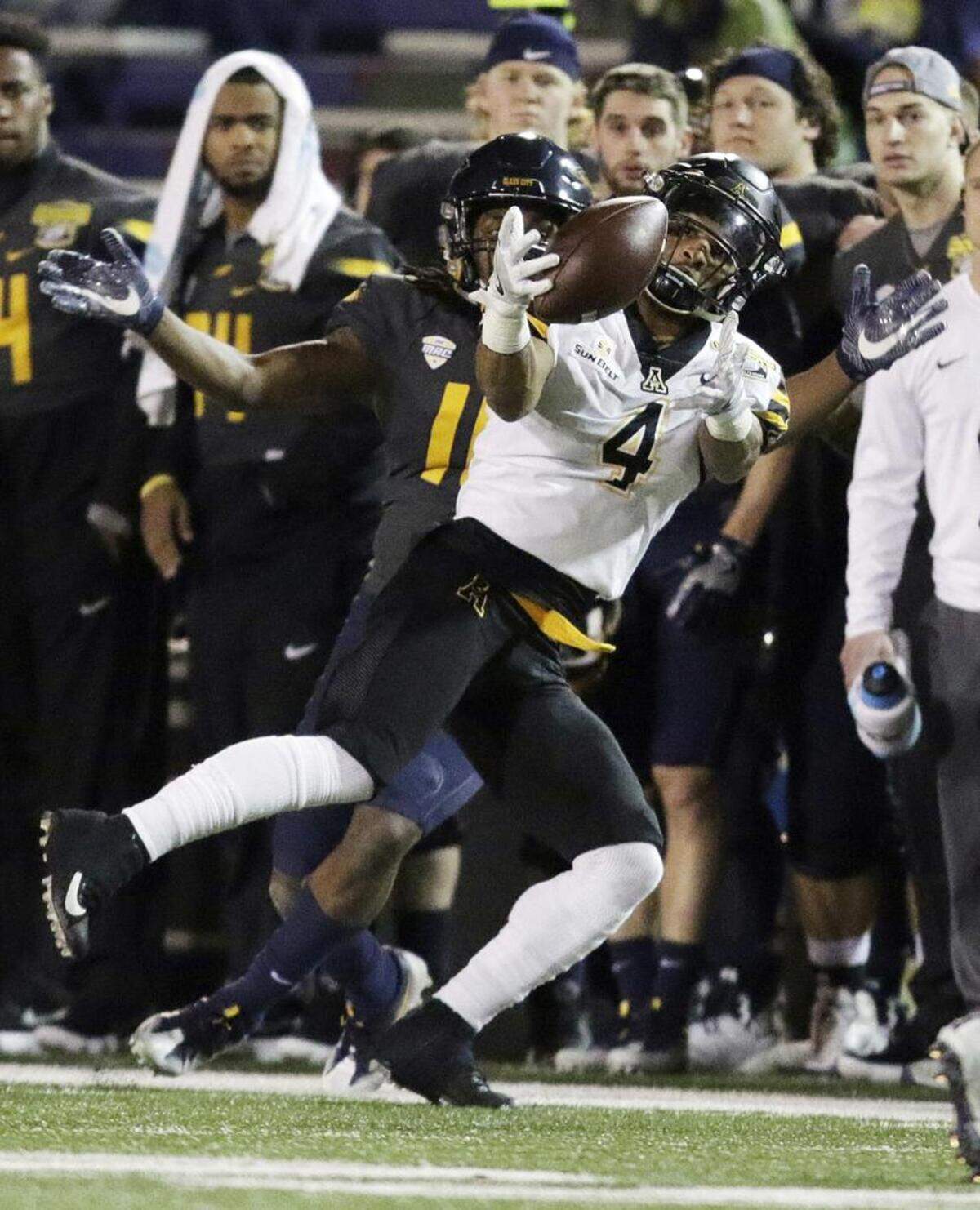 Appalachian State defensive back Clifton Duck (4) makes an interception against Toledo – the same team that pulled back on a scholarship offer a year earlier – in the 2017 Dollar General Bowl.