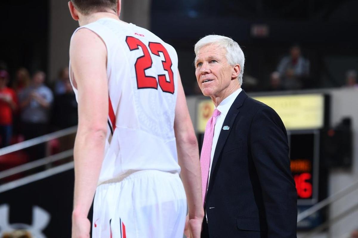 Davidson coach Bob McKillop talks to senior Peyton Aldridge (23) early in the second half of Sunday’s A-10 basketball game at Belk Arena. Aldridge finished with 18 points as the Wildcats lost 66-63.