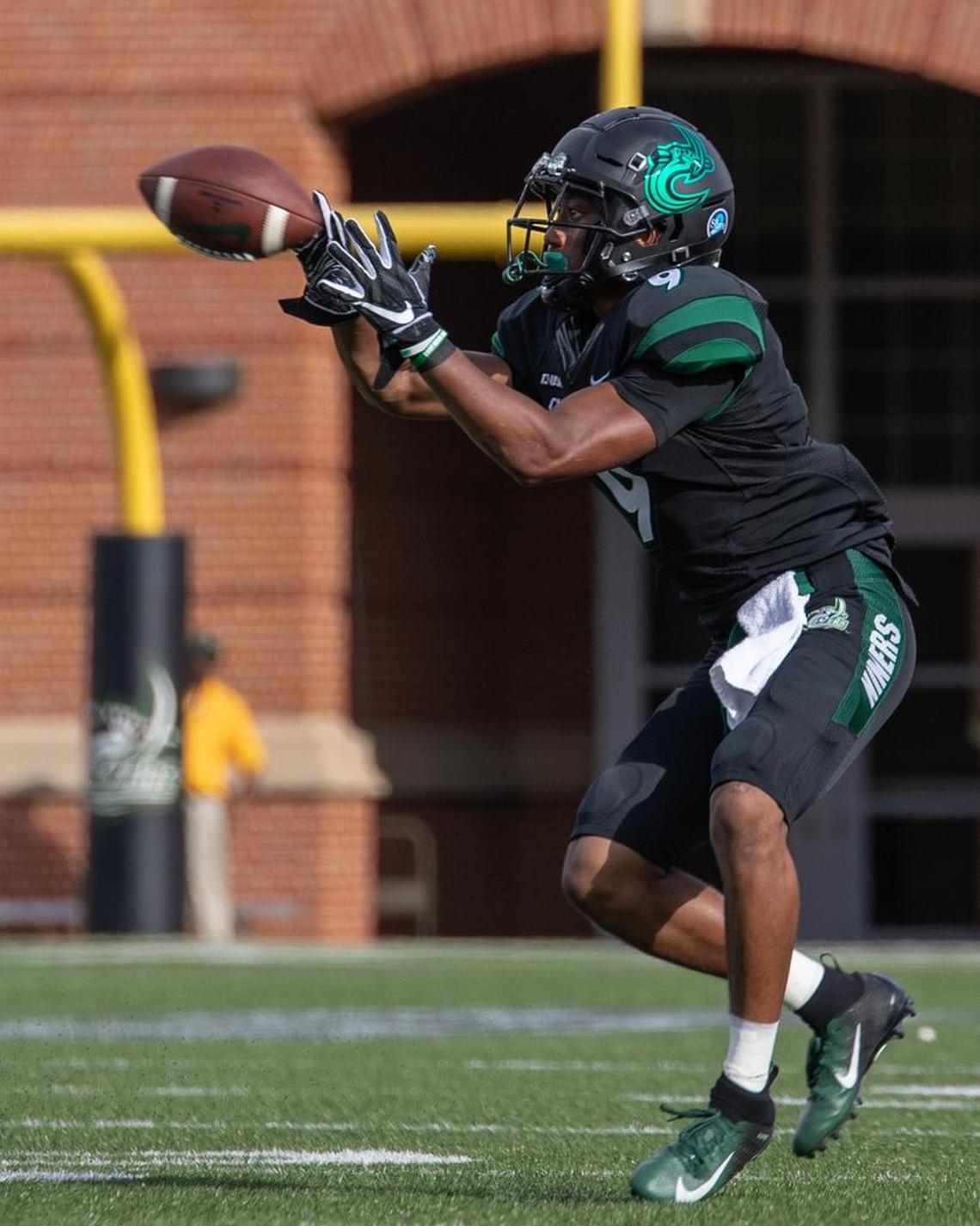 Charlotte 49ers freshman receiver Victor Tucker makes one of his seven catches on a pass from Chris Reynolds in the first half of Thursday’s Conference USA opener at Richardson Stadium. Charlotte won 28-25.