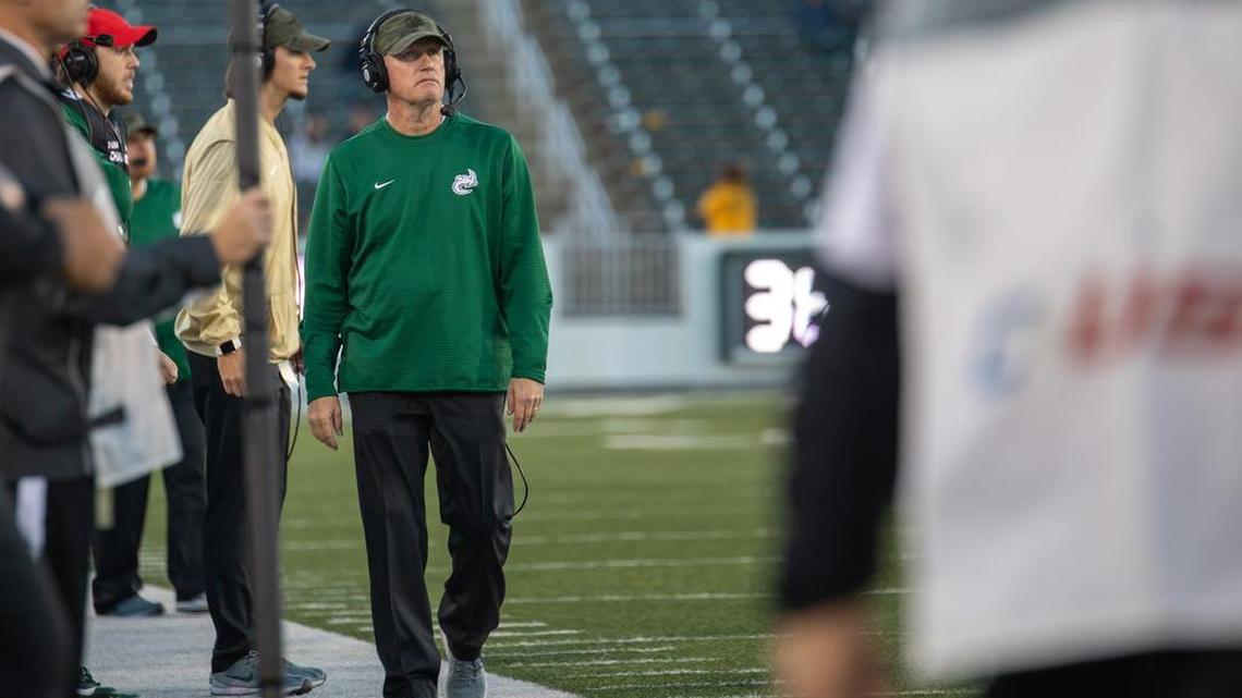 Charlotte 49ers coach Brad Lambert walks the sideline during Saturday’s Conference USA football game against Florida International. FIU won 42-35.
