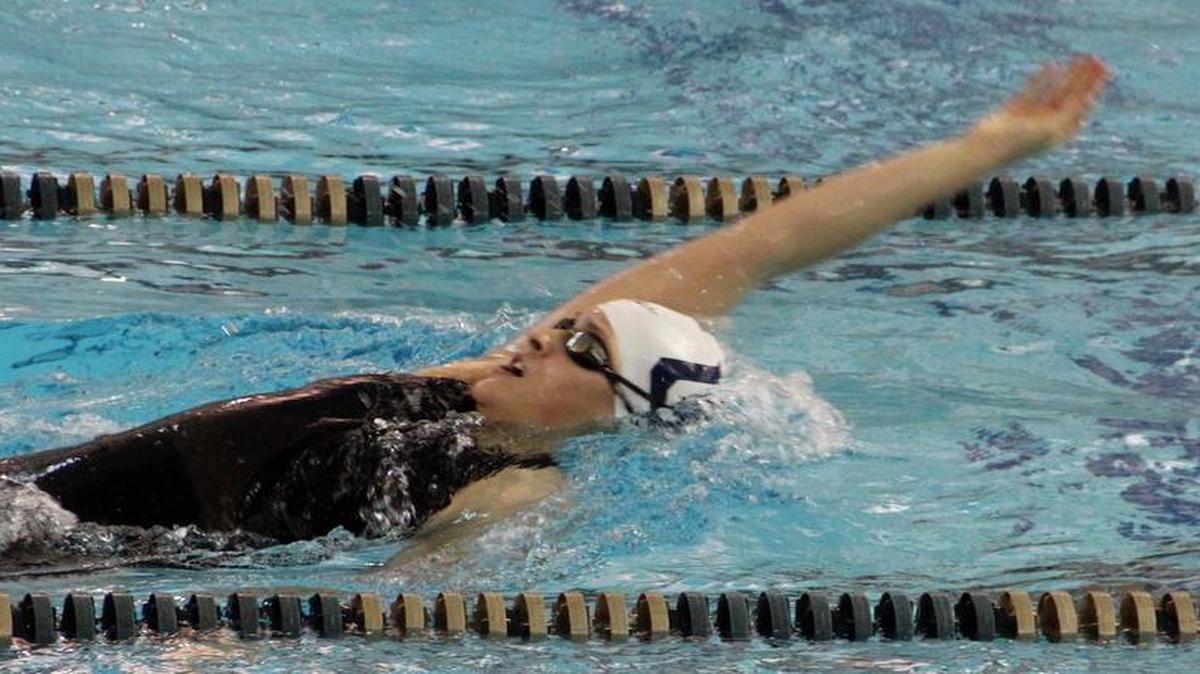 Queens’ swimmer Caroline Arakelian swims the opening leg in the women’s 200-yard individual medley at the Royals’ meet against Lenoir-Rhyne on Jan. 9 at the Levine Center pool in Charlotte.