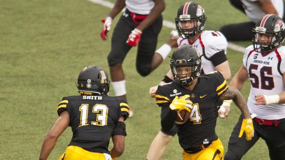 Appalachian State’s Clifton Duck, the former Butler High standout, returns a punt 62 yards for a touchdown in the second quarter of Saturday’s football game against visiting Gardner-Webb. App State won 72-7.