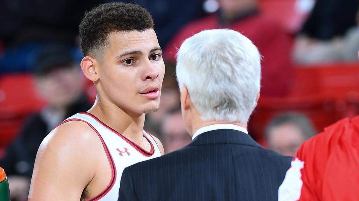 Davidson sophomore Kellan Grady listens to coach Bob McKillop during a timeout Thursday night, when the Wildcats played host to Washington & Lee in an exhibition at Belk Arena. Grady scored 20 points in the 116-56 win. On Tuesday, Davidson will open its season against visiting Cleveland State.