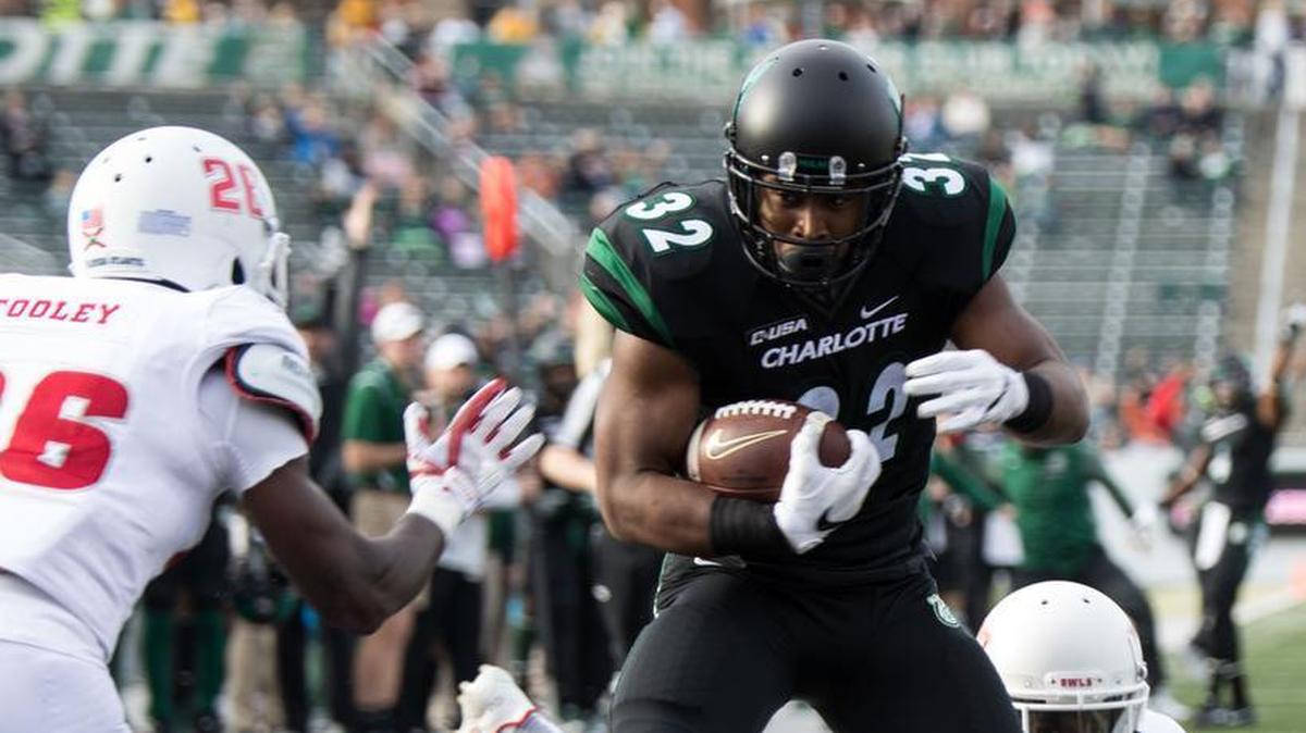Running back Benny LeMay (32) is one of eight returning offensive starters for the Charlotte 49ers.