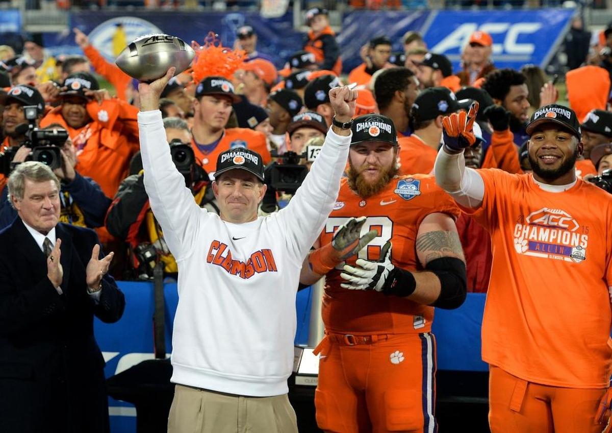 Clemson football coach Dabo Swinney has won two national championships in the past three years with the Tigers. Charlotte 49ers coach Will Healy is largely trying to model his program on Clemson’s.