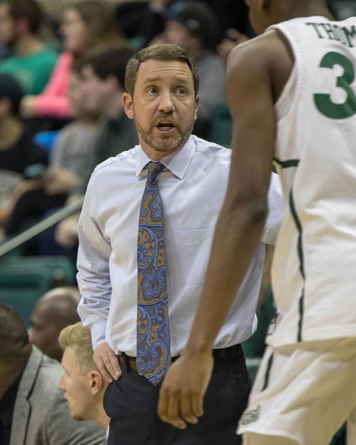 Charlotte 49ers interim men’s basketball coach Houston Fancher directs his squad in Thursday’s 91-83 Conference USA loss to Marshall at Halton Arena.
