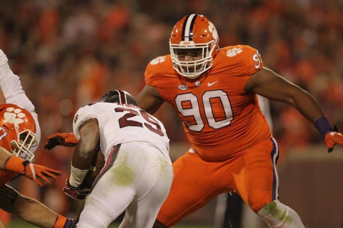 Clemson defensive tackle Dexter Lawrence (right) is an imposing figure on the football field. South Carolina running back A.J. Turner found out just how imposing on this play last November at Clemson.