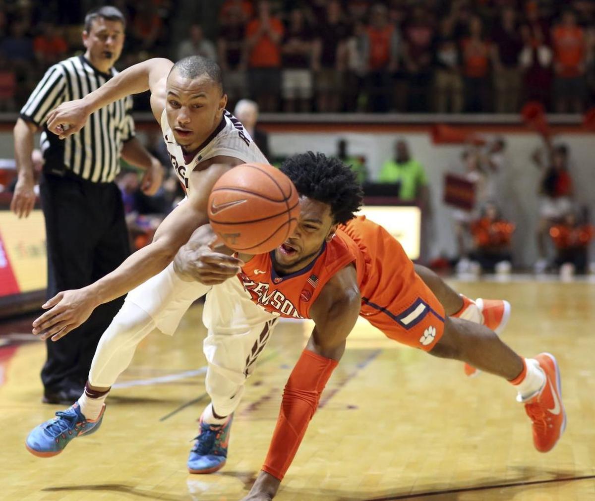 Clemson guard Gabe DeVoe (right) is entering his senior season and is a projected starter.