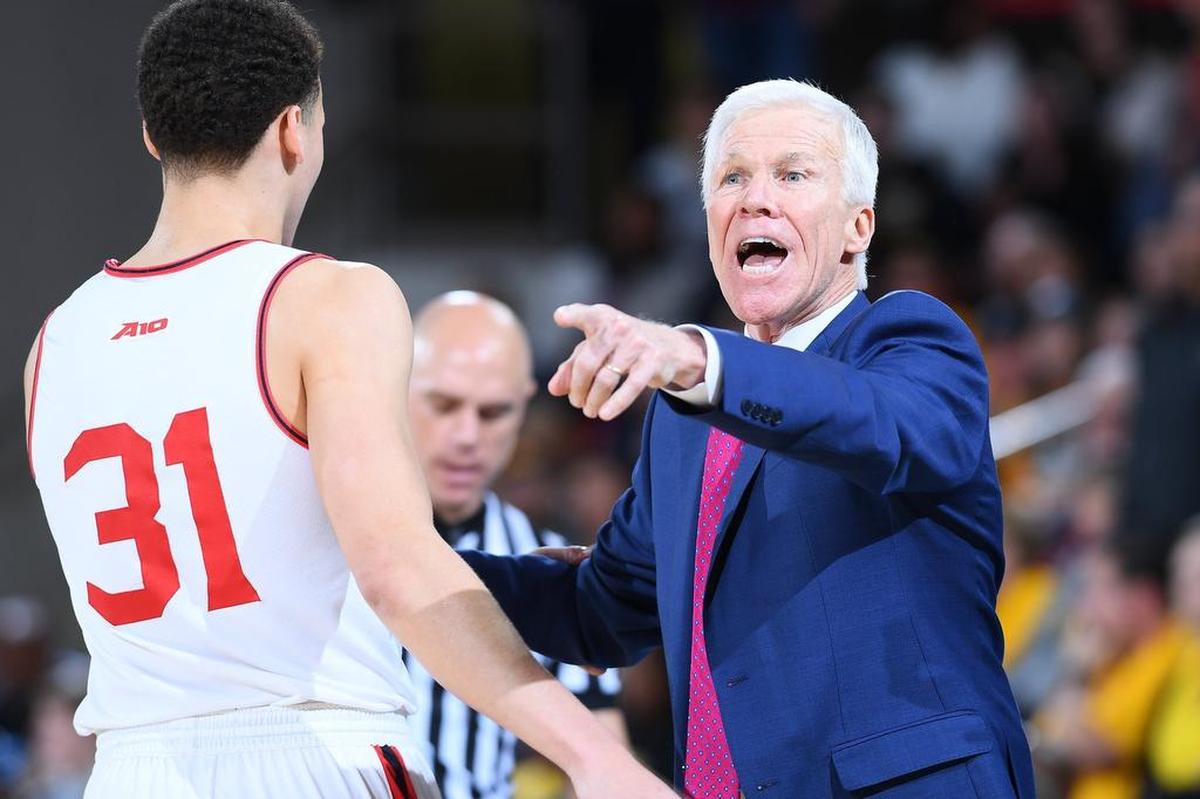 Davidson coach Bob McKillop shouts instructions to sophomore guard Kellan Grady and the Wildcats in the second half of Saturday’s Atlantic 10 men’s basketball game against VCU at Belk Arena. Davidson won 64-57.