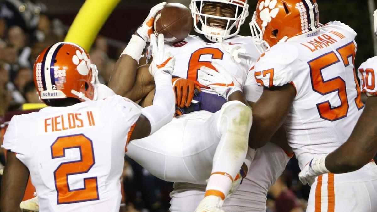 Clemson linebacker Dorian O'Daniel (6) celebrates with teammates after returning an interception for a touchdown in the second half last Saturday at Virginia Tech. Clemson, which won 31-17, will host Wake Forest this week.
