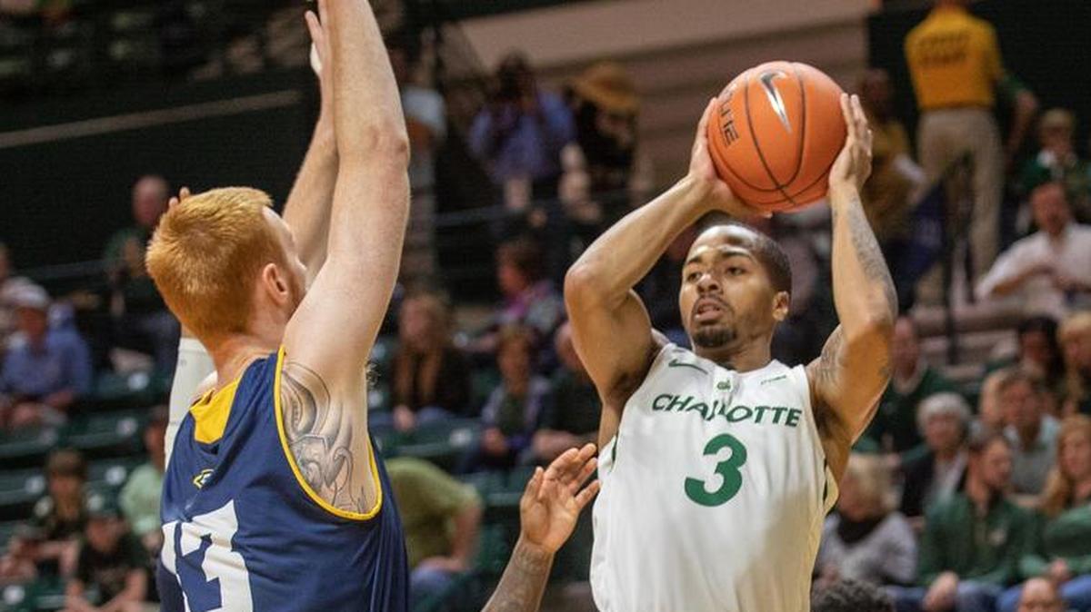 Point guard Jon Davis, right, averages 21.5 points to lead the Charlotte 49ers.