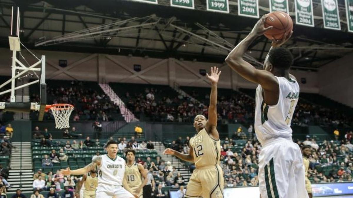 Guard Austin Ajukwa (5) puts up a shot in Saturday’s game against FIU.