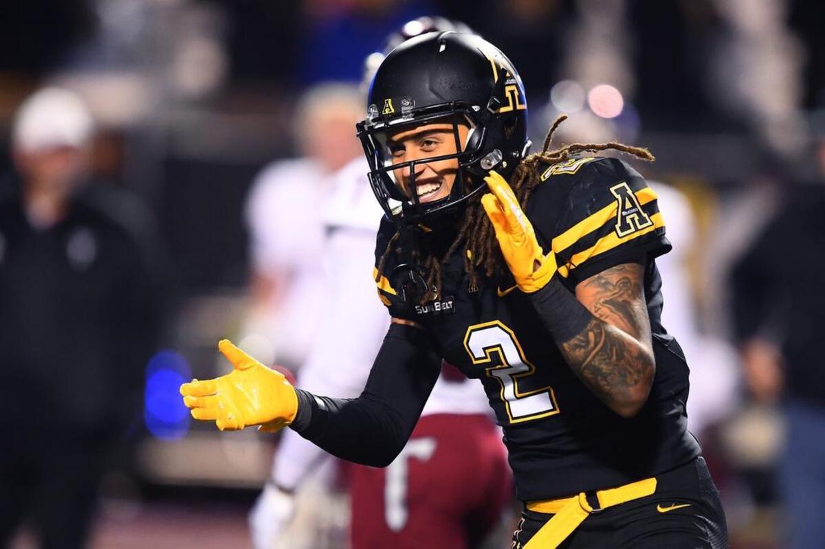Appalachian State receiver Corey Sutton, the former Mallard Creek High standout, celebrates the Mountaineers’ 21-10 win over Troy in the final minutes of Saturday’s Sun Belt Conference football game at Kidd Brewer Stadium. Appalachian State won 21-10.