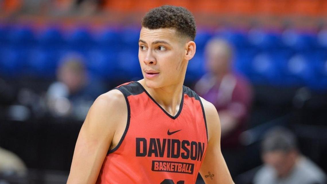 Davidson’s Kellan Grady (31), the Atlantic 10 Rookie of the Year, has averaged 18 points this season, shooting 51 percent from the field. Above, Grady listens to the coaching staff during Wednesday’s practice at the Taco Bell Arena in Boise, Idaho.