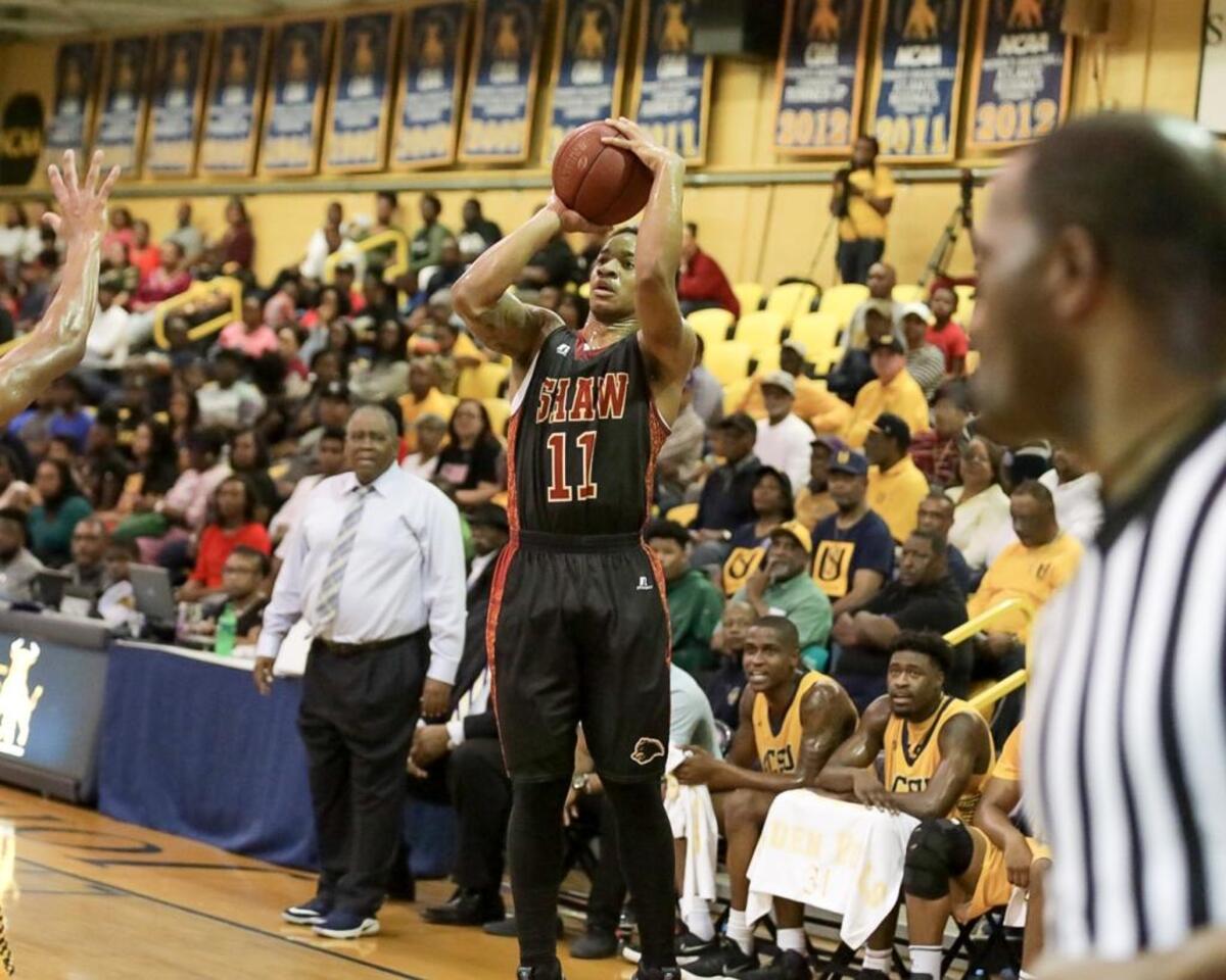 Shaw's Krishaun Myers (11) pulls up and knocks down a 3-pointer. Myers, who scored a game-high 21 points off the bench, was the difference for Shaw, which rallied to beat J.C. Smith, 78-75, Saturday at Brayboy Gymnasium.