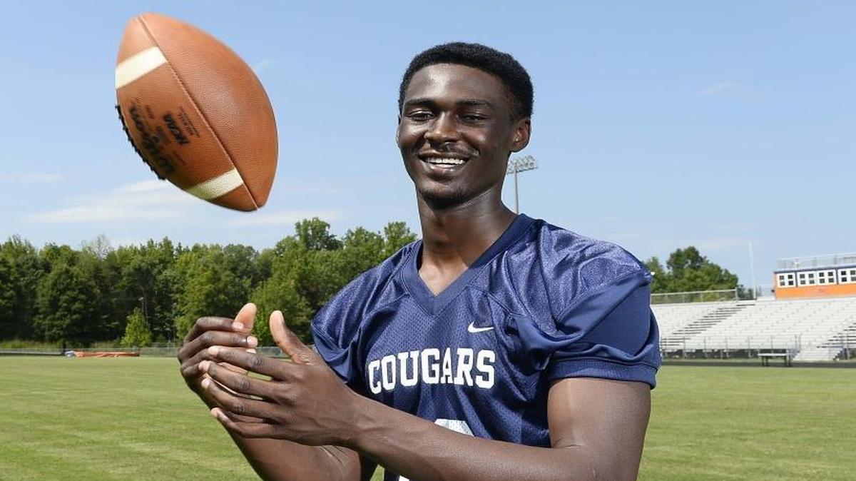 Vance High quarterback Kingsley Ifedi signed to play college football at East Carolina on Wednesday.