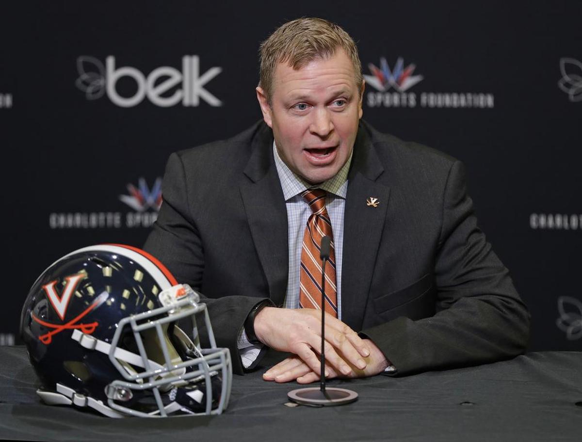 Virginia’s Bronco Mendenhall is in his third season as the Cavaliers’ football coach. Mendenhall was in Charlotte on Thursday for the Belk Bowl news conference. The Cavaliers will play South Carolina in the bowl on Dec. 29 at Bank of America Stadium.