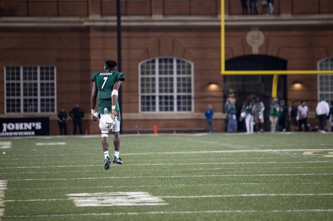 Charlotte 49ers quarterback Hasaan Klugh celebrates Saturday’s 25-24 win over Conference USA rival Ala.-Birmingham at Richardson Stadium. The victory ended a 10-game losing streak for the 49ers.