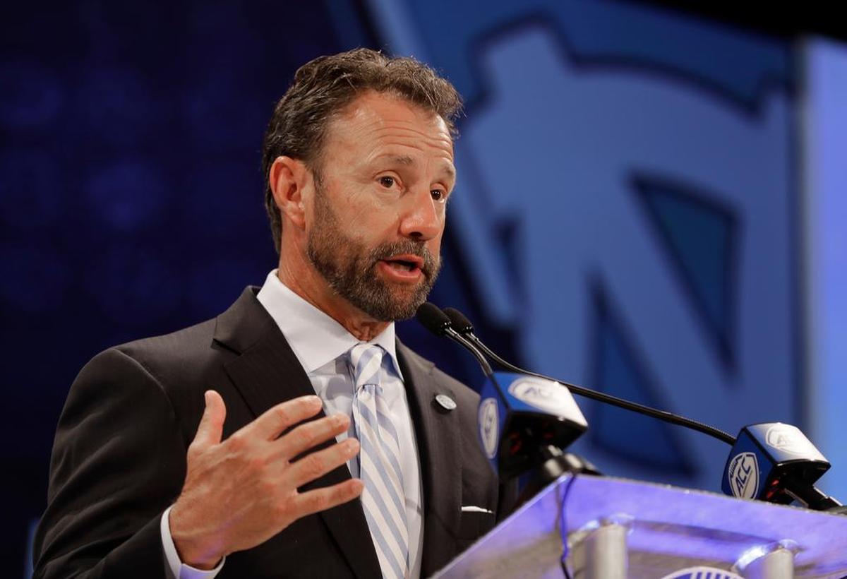 North Carolina head coach Larry Fedora answers a question during a news conference at the NCAA Atlantic Coast Conference college football media day in Charlotte, N.C., Wednesday, July 18, 2018. (AP Photo/Chuck Burton)