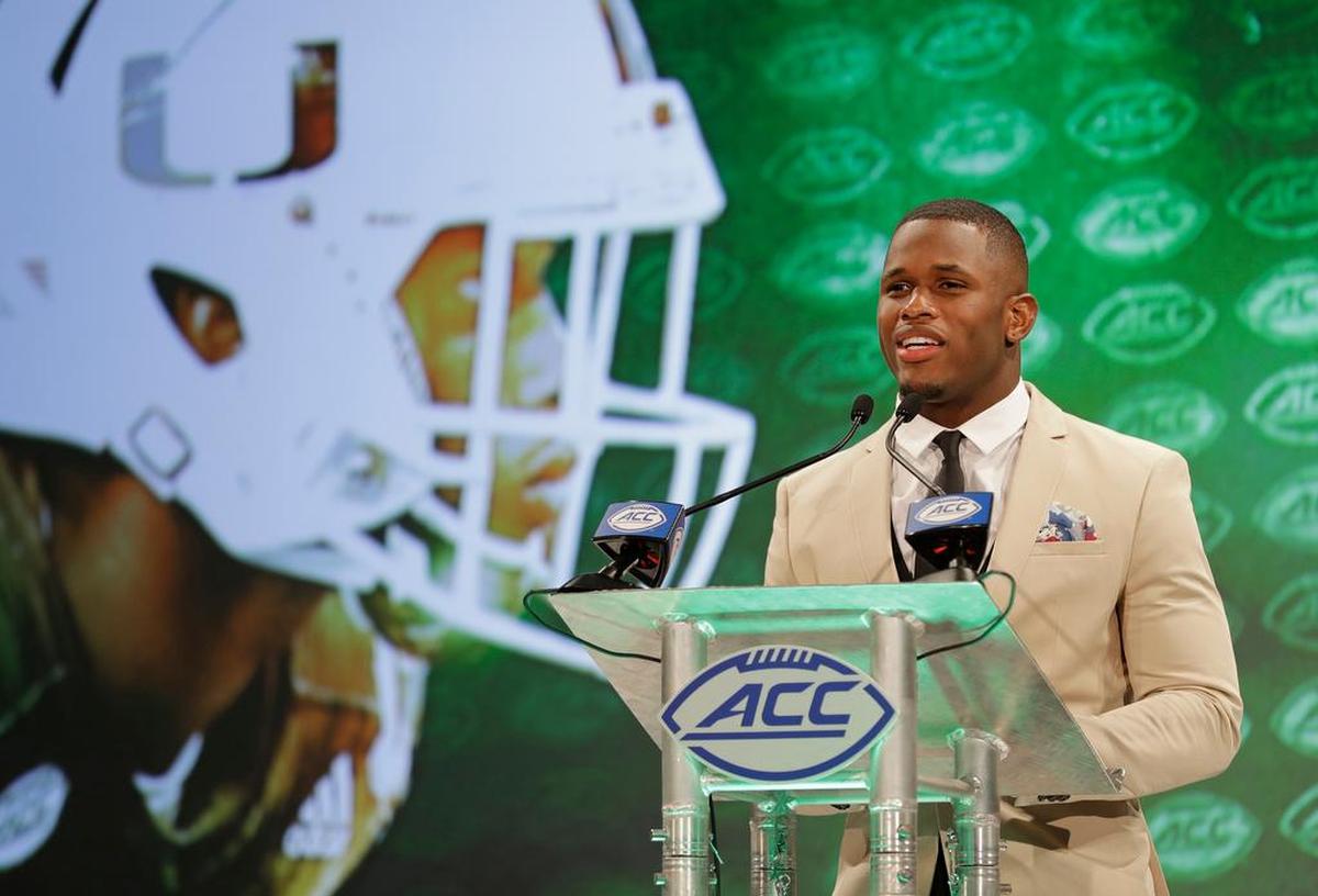 Miami’s Jaquan Johnson answers a question during a news conference at the NCAA Atlantic Coast Conference college football media day in Charlotte, N.C., Wednesday, July 18, 2018. (AP Photo/Chuck Burton)