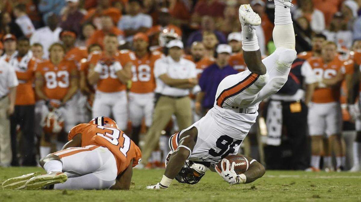 Auburn running back Kamryn Pettway (36) is tackled by Clemson cornerback Ryan Carter (31) during the second half of Saturday’s game, a 14-6 win for Clemson.