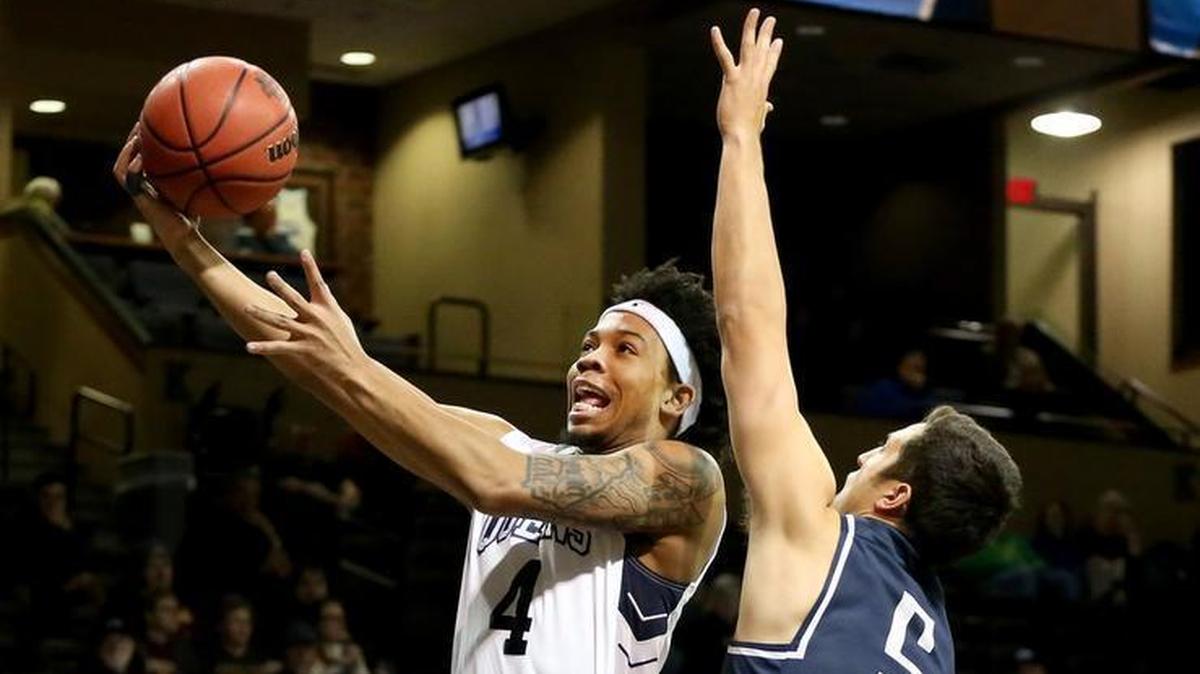 Queens guard Mike Davis (4) scored 11 points against California Baptist in Tuesday’s NCAA basketball Division II Elite Eight game at the Sanford Pentagon in Sioux Falls, S.D. The Royals won 100-94 to advance to the Final Four.