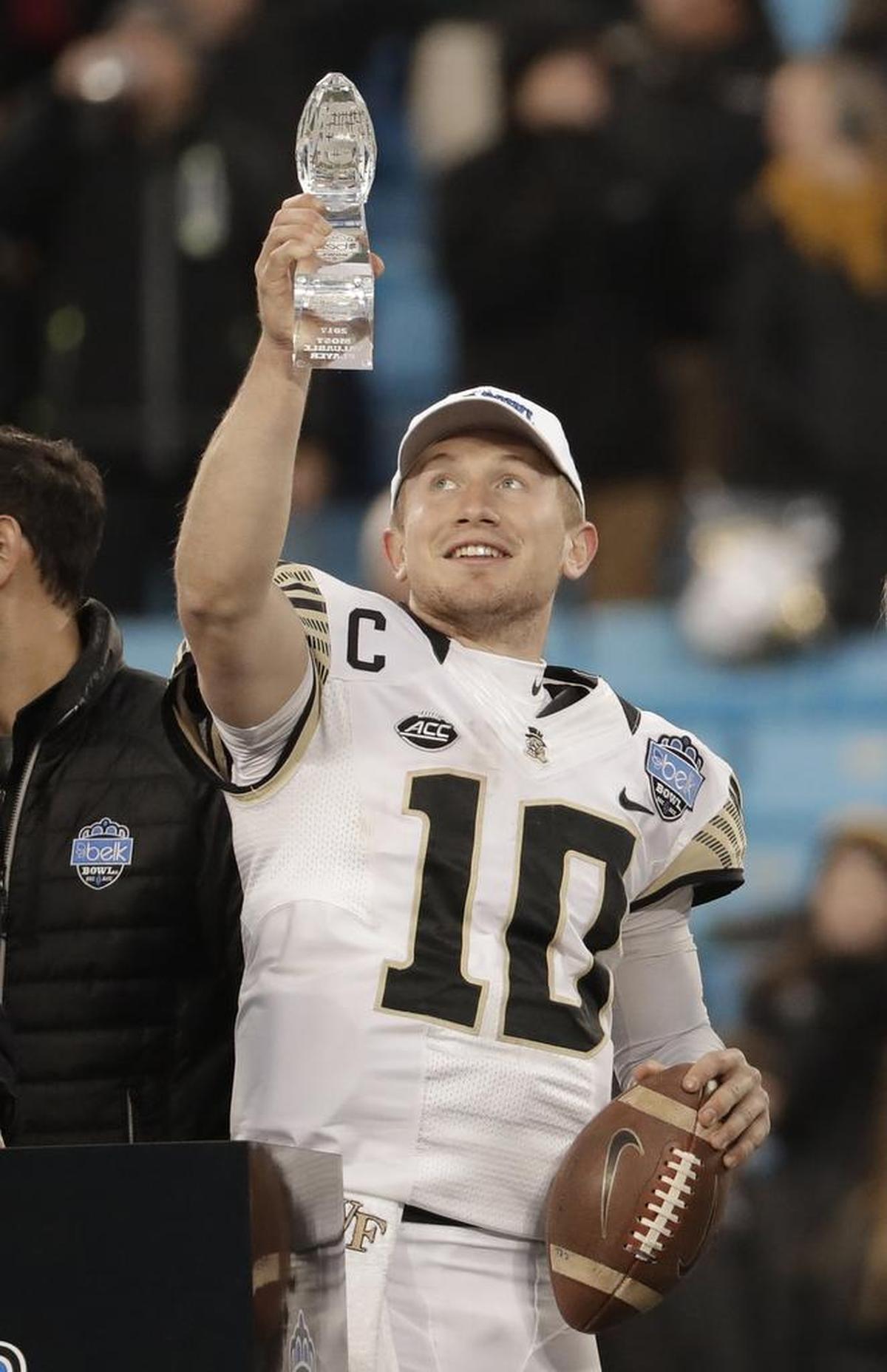 Wake Forest quarterback John Wolford was named Belk Bowl Most Valuable Player after the Deacons beat Texas A&M 55-52 Friday afternoon at Bank of America Stadium.