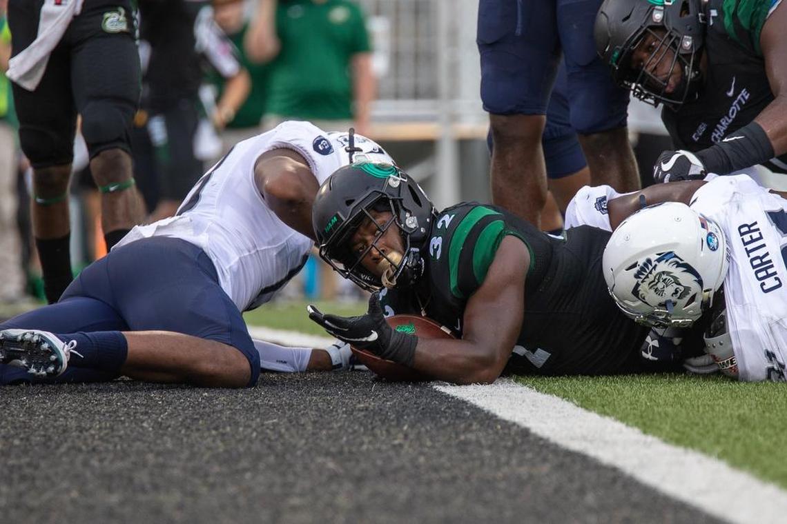 Charlotte 49ers running back Benny LeMay converts a crucial 2-point conversion against Old Dominion in Thursday’s Conference USA football game at Richardson Stadium. Charlotte won 28-25.